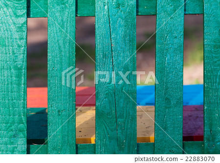 Vintage wood fence background with peeling paint Vintage wood fence background with peeling paint 22883070