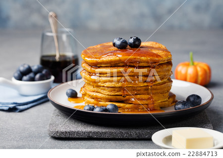 Pumpkin pancakes with maple syrup and blueberries 22884713