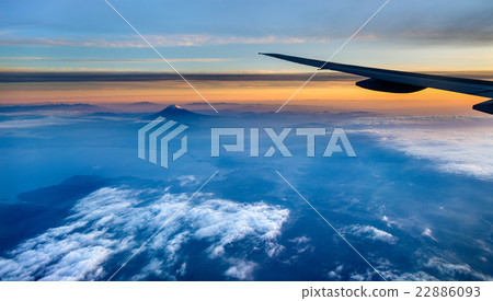 View of Mount Fuji through airplane window 22886093