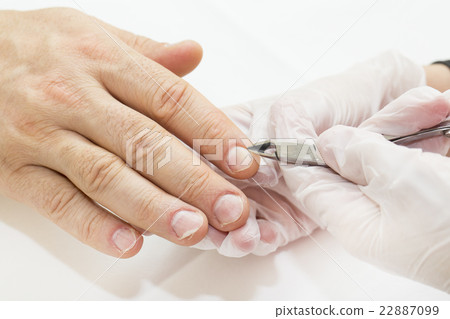 process of the male manicure in a beauty salon process of the male manicure in a beauty salon 22887099