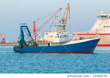 Seiner fishing in the bay. Seiner fishing in the bay. 22889258
