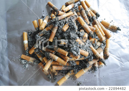 Mountain of cigarette butts - Stock Photo [22894482]