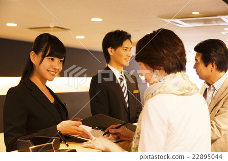 Hotel hospitality hotel man concierge couple 22895044