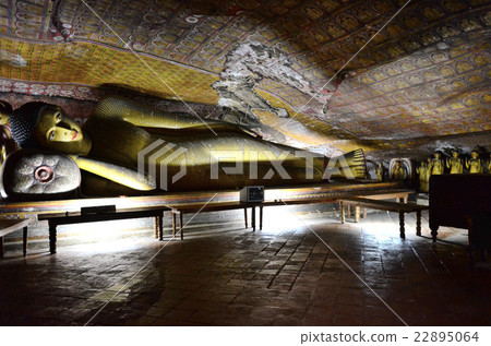 A 9-meter-long sleeping Buddha resting in the 3rd cave in the Tambula Cave 22895064