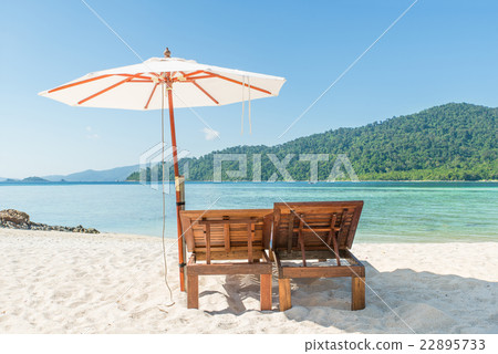 Beach Chairs and Umbrella in Phuket, Thailand. 22895733