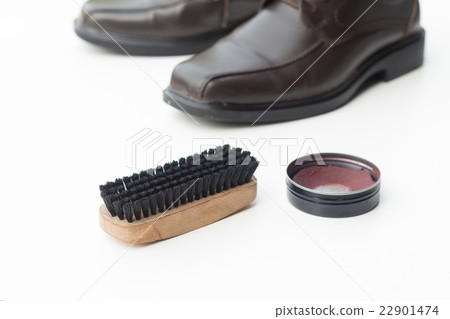 Dark brown shoe with shoe polish and brush shoe Dark brown shoe with shoe polish and brush shoe 22901474