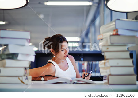 Asian college student at hard exam preparation  22902106