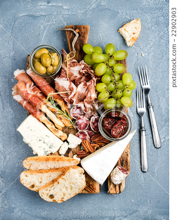 Cheese and meat appetizer selection. Prosciutto di 22902903