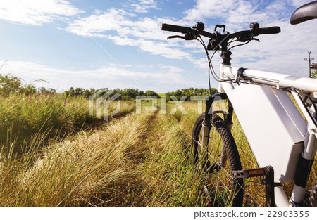 Mountain bicycle at sunny day on the dirt road 22903355