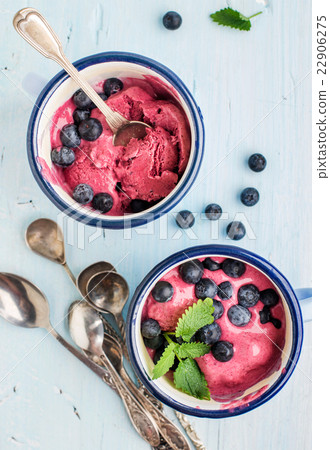 Homemade blueberry ice cream scoops with fresh 22906275