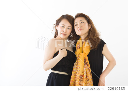 Two women in a fashionable dress 22910185