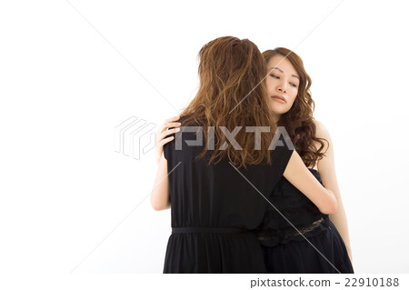 Two women in a fashionable dress 22910188