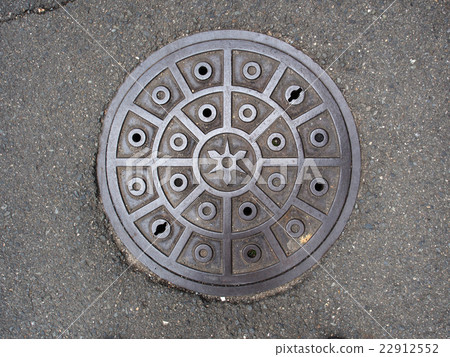 Circle steel manhole cover isolated on white Circle steel manhole cover isolated on white 22912552