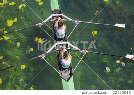 Two rowers rowing Two rowers rowing 22915910