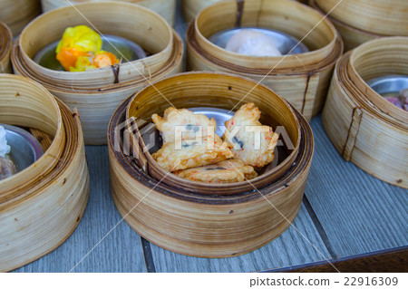 various dim sum in bamboo steamer in chinese  22916309