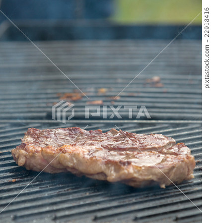 beef steaks on the grill 22918416