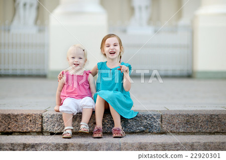Portrait of two little sisters Portrait of two little sisters 22920301