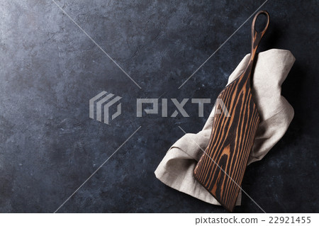 Kitchen table with cutting board over towel Kitchen table with cutting board over towel 22921455