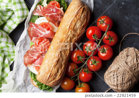 Ciabatta sandwich with salad, prosciutto Ciabatta sandwich with salad, prosciutto 22921459