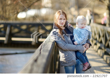 Toddler girl in mothers hands Toddler girl in mothers hands 22921707