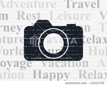 Vacation concept: Photo Camera on wall background 22922756