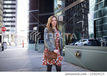 Young professional Caucasian woman on city street Young professional Caucasian woman on city street 22924113