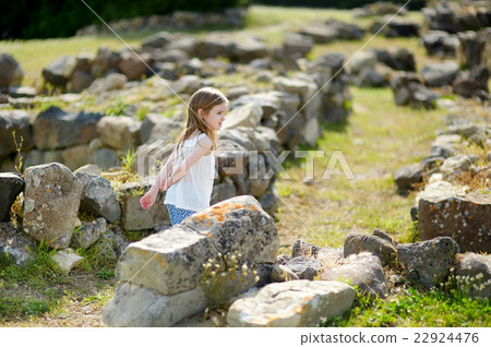 Little girl sightseeing historical ruins Little girl sightseeing historical ruins 22924476