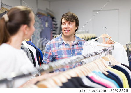 Couple doing shopping at the clothing store. 22928876