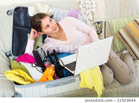 Woman preparing to travel 22929644