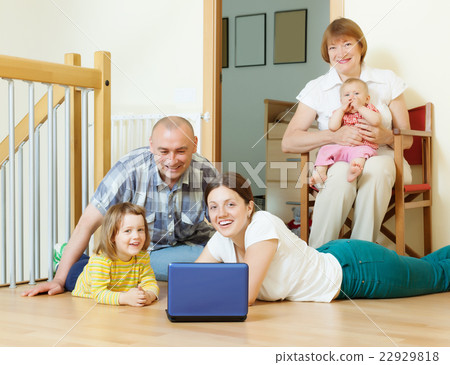 Happy three generations family 22929818
