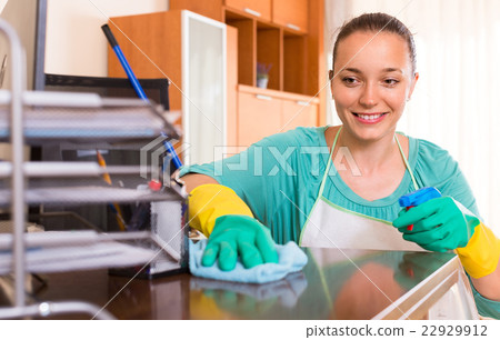 Woman cleaning at the office 22929912