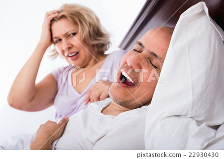 Mature angry girlfriend cannot stand guy snoring loudly Mature angry girlfriend cannot stand guy snoring loudly 22930430