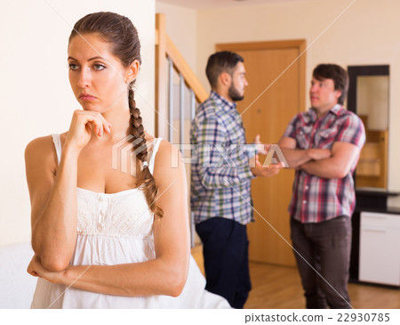 Unhappy woman with men having troubles 22930785