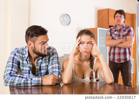 Unhappy man having argue with partners 22930817