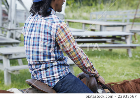 Male horse riding Male horse riding 22935567
