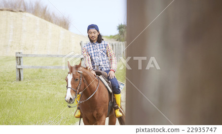 Male horse riding Male horse riding 22935747