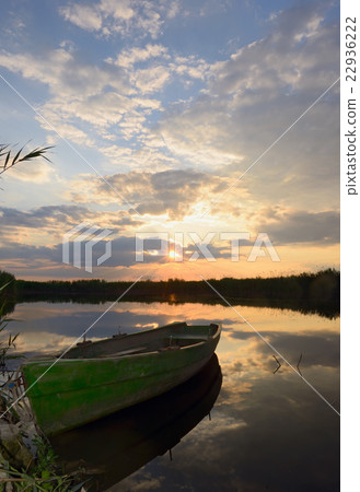 fisherman boat at sunset fisherman boat at sunset 22936222