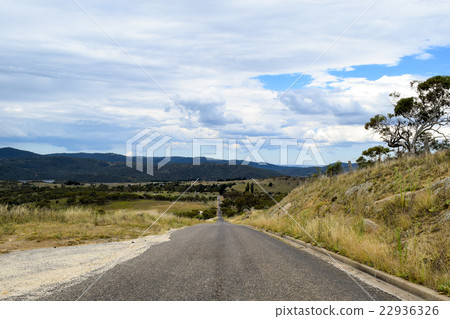 Straight country road fading into the distance 22936326
