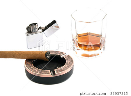 cigar in ashtray and glass of whiskey 22937215