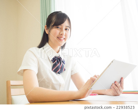 Girls high school students with tablets Girls high school students with tablets 22938523