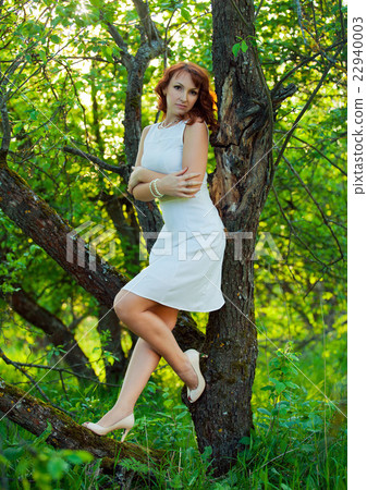 Free Happy Woman with Gorgeous Red Hair Enjoying 22940003