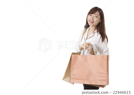 A young woman who enjoys shopping A young woman who enjoys shopping 22940015