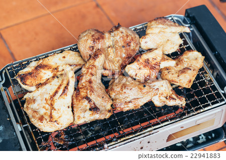 Charred grilling pork tenderloin on electric grill 22941883