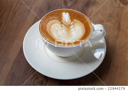 A cup of coffee latte A cup of coffee latte 22944179