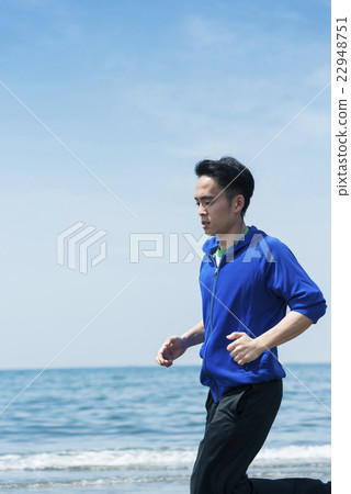 Young people running on the beach Young people running on the beach 22948751