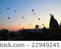 A balloon floating in the sky of Cappadocia at dawn 22949245