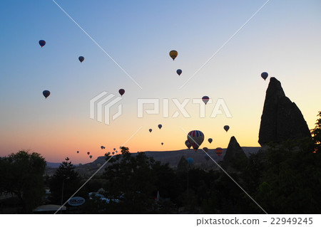 A balloon floating in the sky of Cappadocia at dawn 22949245