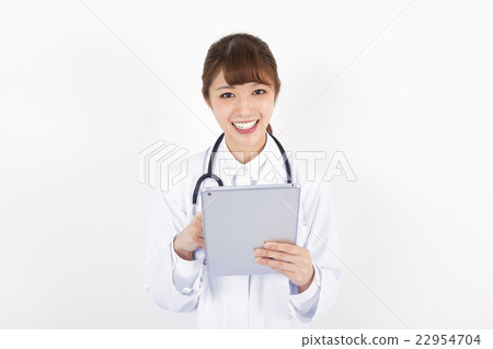 Female doctor nurse using tablet 22954704