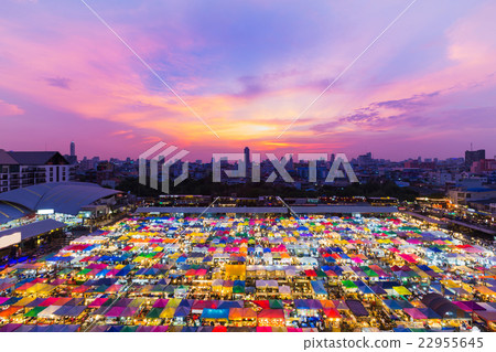 Sunset over night market rooftop  22955645