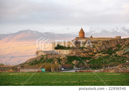 Ancient monastery in front of mountain 22956540
